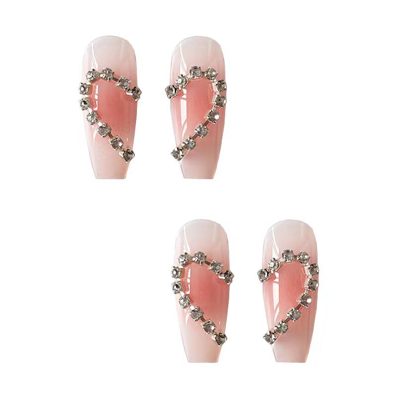 Artistic gel nails with heart accents Bowlift