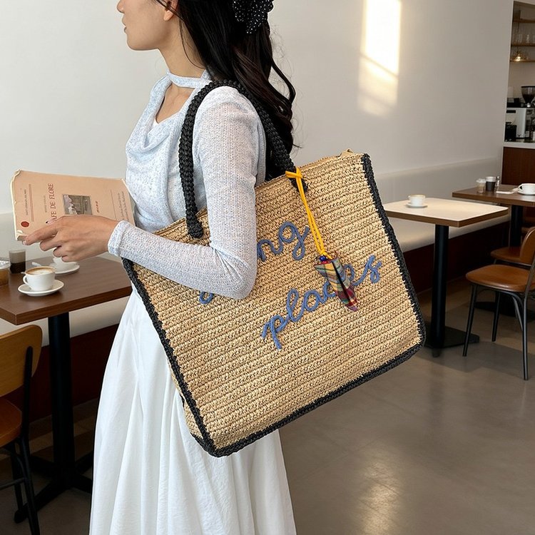 Spacious straw shopping bag with lettering Bowlift