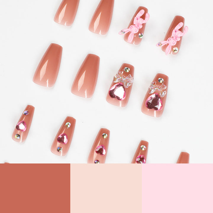 Artificial nail extensions with artistic decorations Bowlift