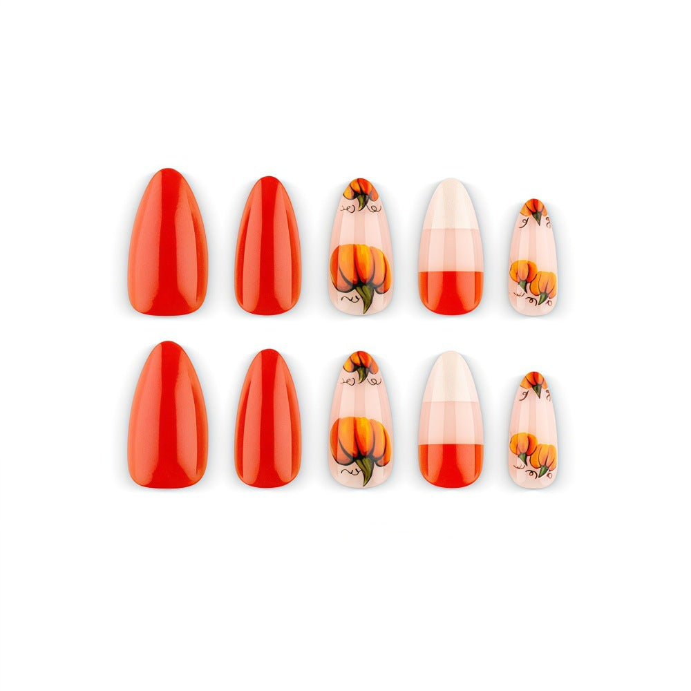 Artificial nails in autumn pumpkin design Bowlift