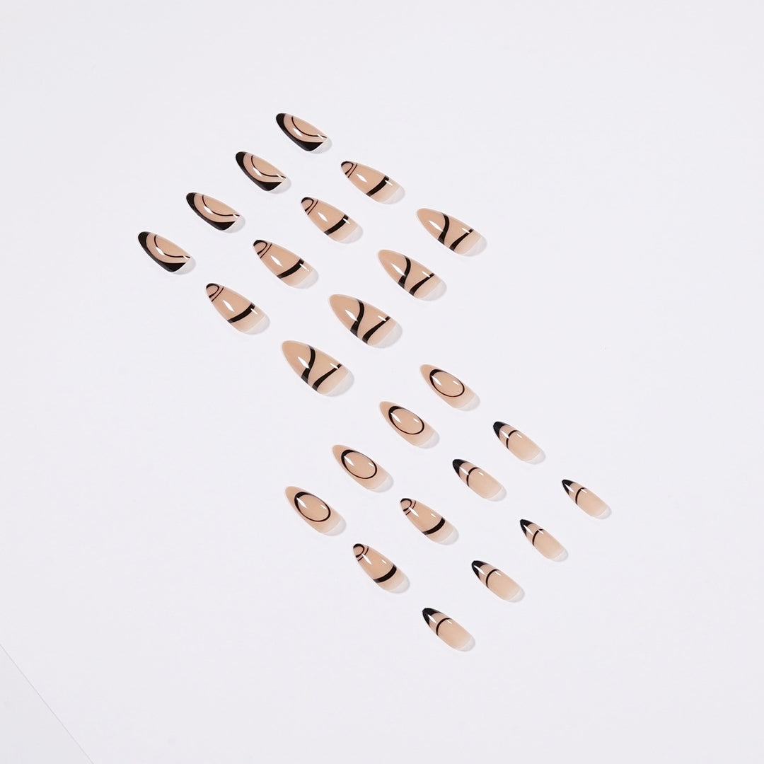 Artful stiletto nails with geometric accents Bowlift