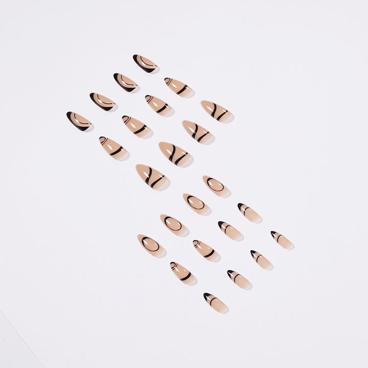 Artful stiletto nails with geometric accents Bowlift