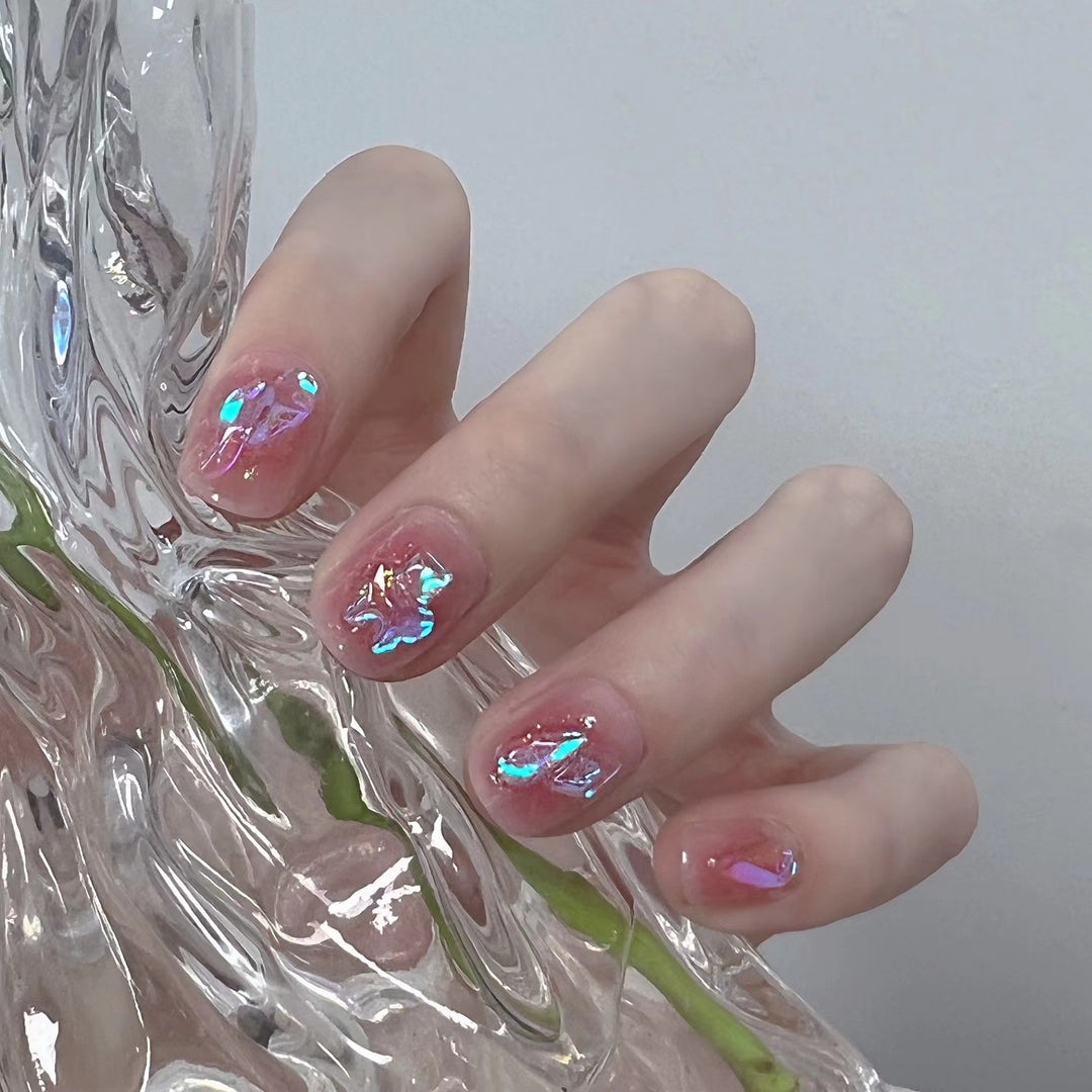 Shiny nail art with holographic accents Bowlift