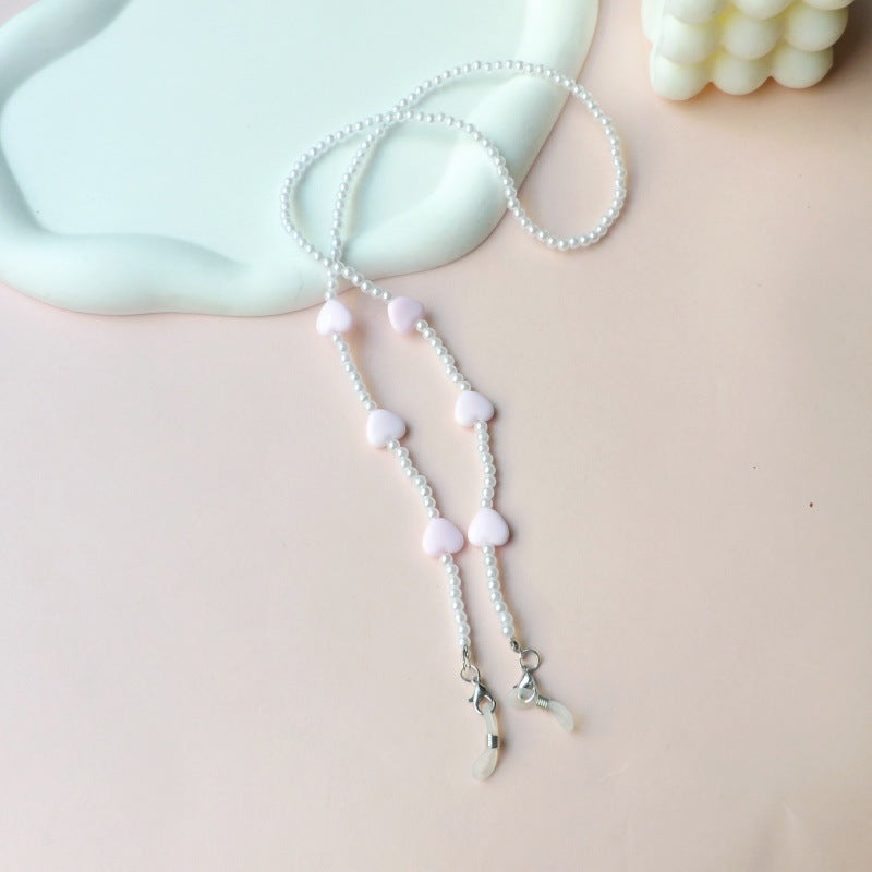 Fashionable pearl necklace with heart pendants Bowlift