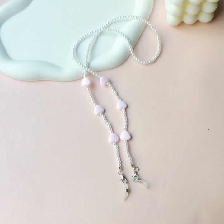 Fashionable pearl necklace with heart pendants Bowlift