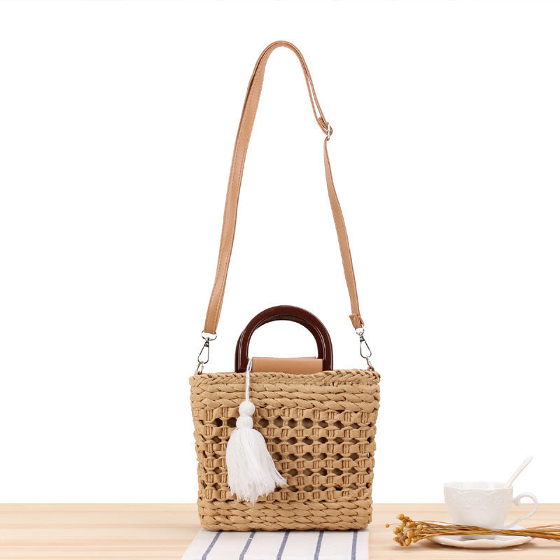 Designer handbag with stylish wooden handle and practical detachable shoulder strap Bowlift