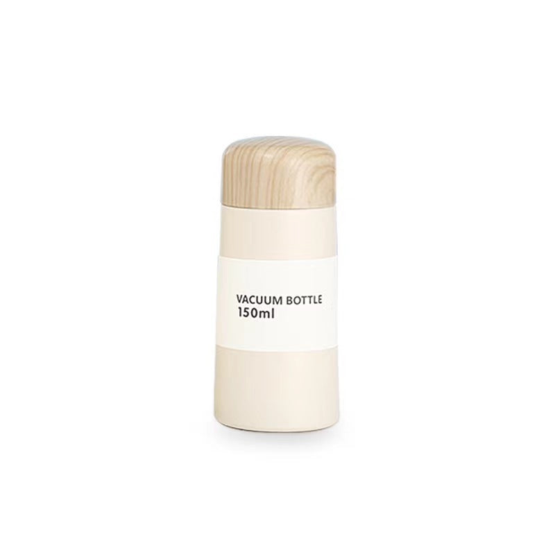 Women vacuum-insulated water bottle with innovative wooden lid Bowlift