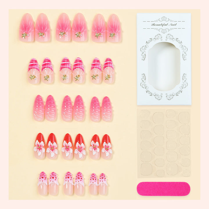 Artistic Press-On Nail Set with Floral and Decorative Accents Bowlift