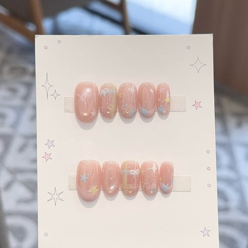 Artificial nails with romantic star and glitter motifs Bowlift