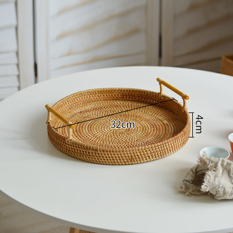 Round serving platter made of braided rattan Bowlift