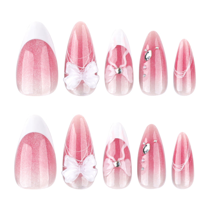 Artful acrylic nails with floral design and glitter embellishment Bowlift