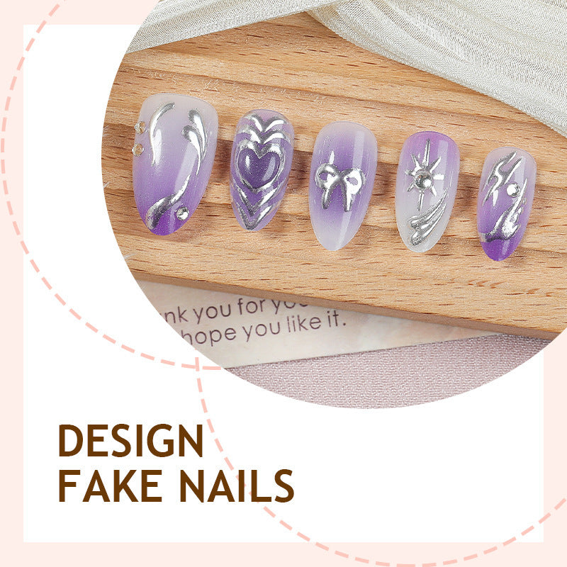 Acrylic nail set with elegant ombre design and delicate embellishments Bowlift