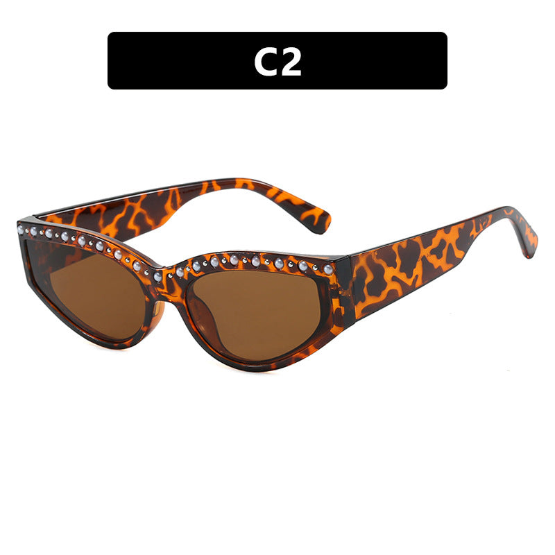Women's Cat-Eye Sunglasses with Sparkling Rhinestone Accents and Animal Pattern Bowlift