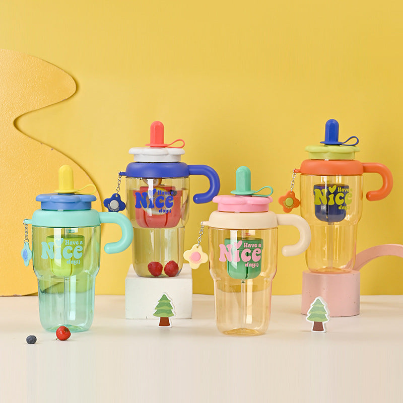 Unisex drinking cup with integrated straw and spill protection Bowlift