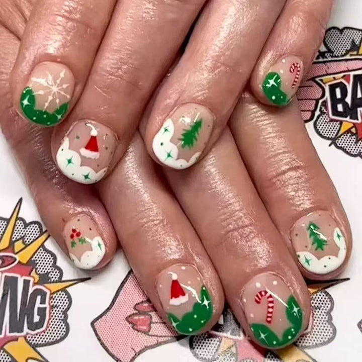 Artificial nail set with Christmas motifs and glitter accents Bowlift