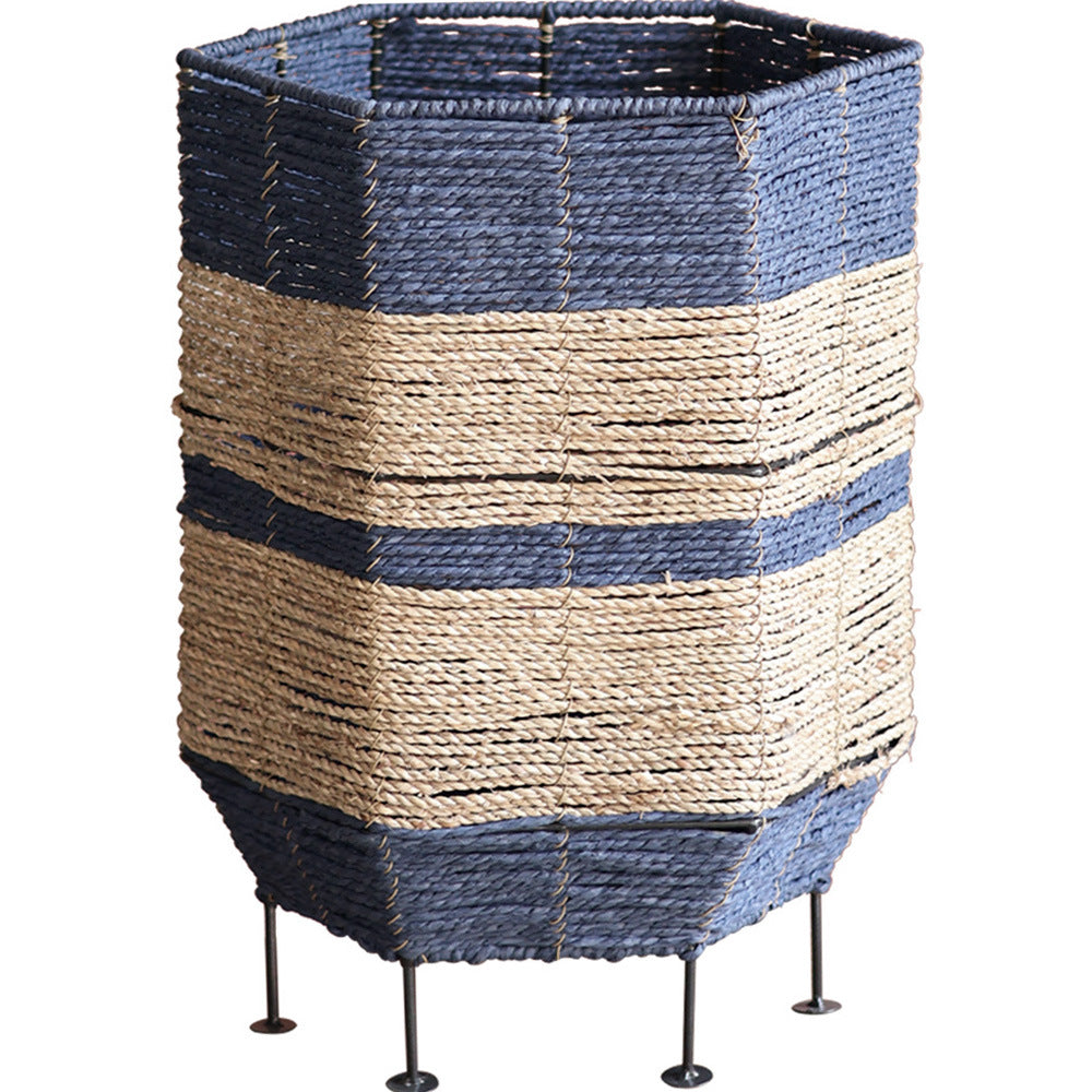 Stylish laundry basket made of rattan with metal legs Bowlift