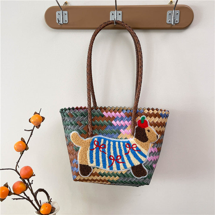 Shoulder bag with playful dog motif Bowlift