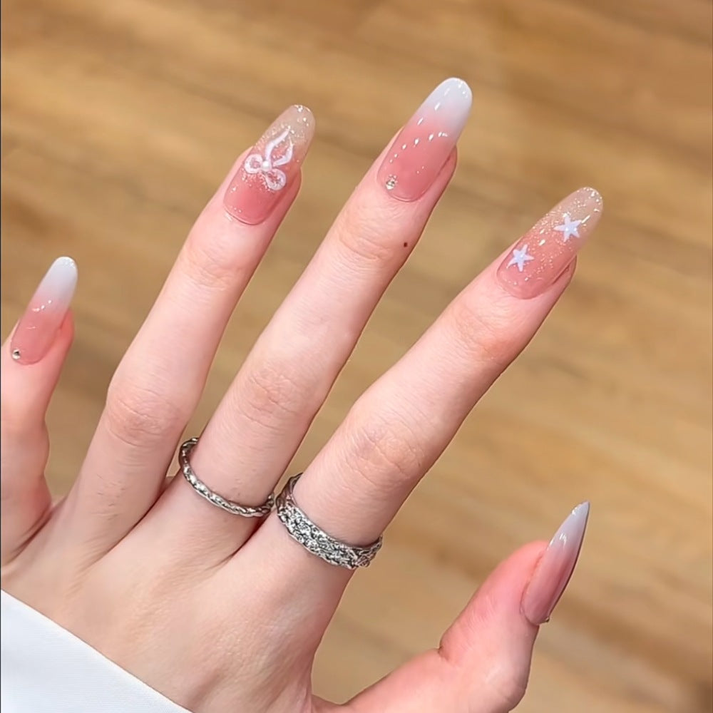 Artistic Press-On Nail Set with Floral and Glossy Accents Bowlift