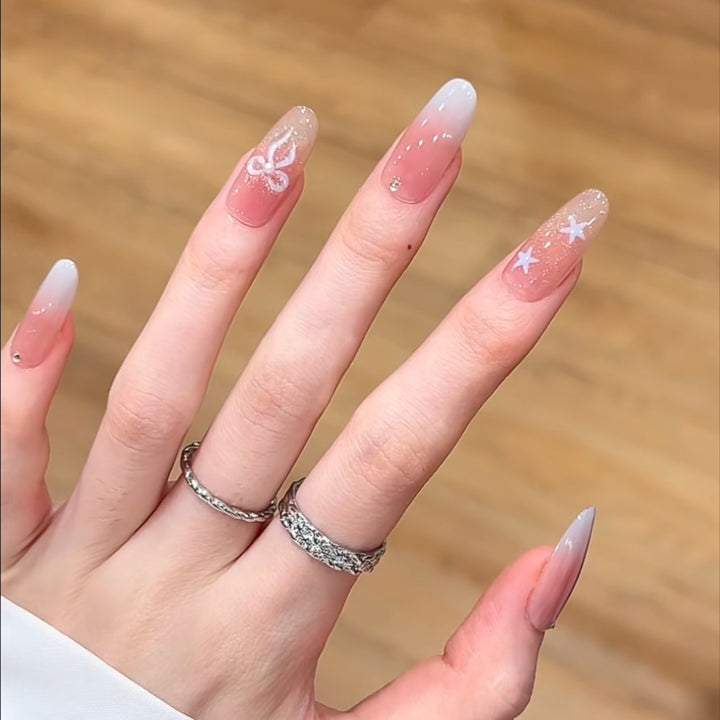 Artistic Press-On Nail Set with Floral and Glossy Accents Bowlift