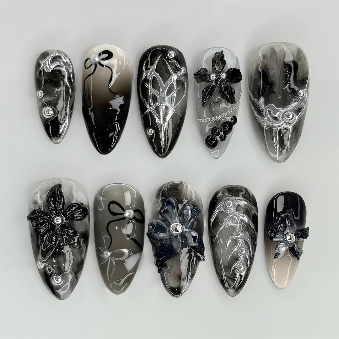Elegant acrylic nail set with complex designs Bowlift