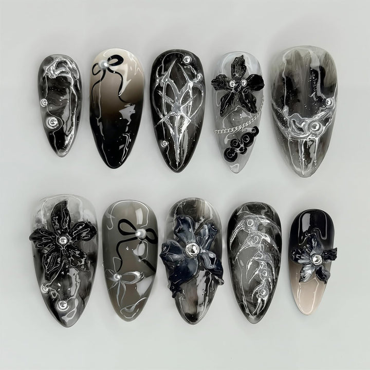 Elegant acrylic nail set with complex designs Bowlift