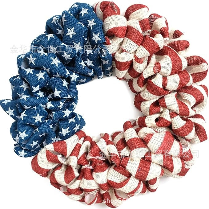 Independence Day rustic round wooden patriotic cross wall plaque with floral accents and God Bless America banner Bowlift