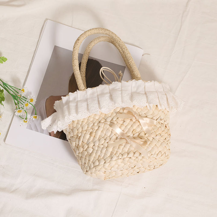 Handcrafted basket bag with delicate ruffles and ribbons Bowlift