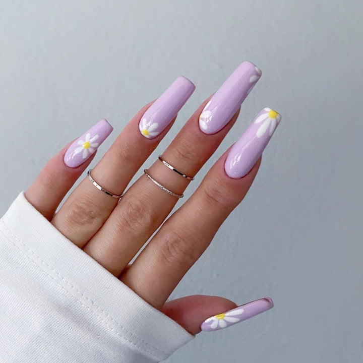 Artistic acrylic nails with flower decoration Bowlift
