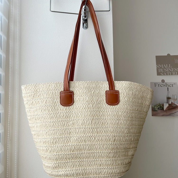 Handcrafted straw bag with elegant leather handles Bowlift