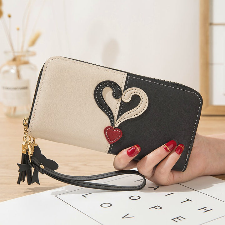 Stylish wallet with heart appliqués Bowlift