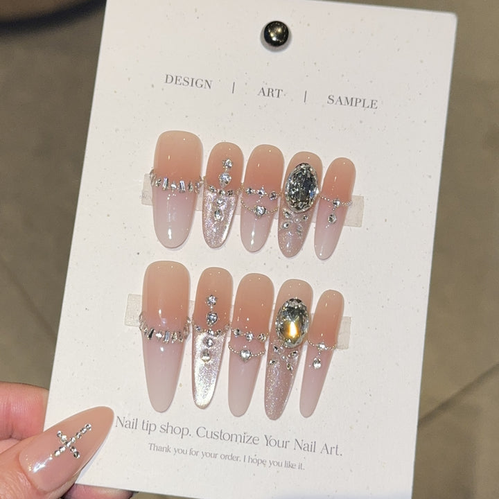 Artificial nails with elegant crystal decorations Bowlift