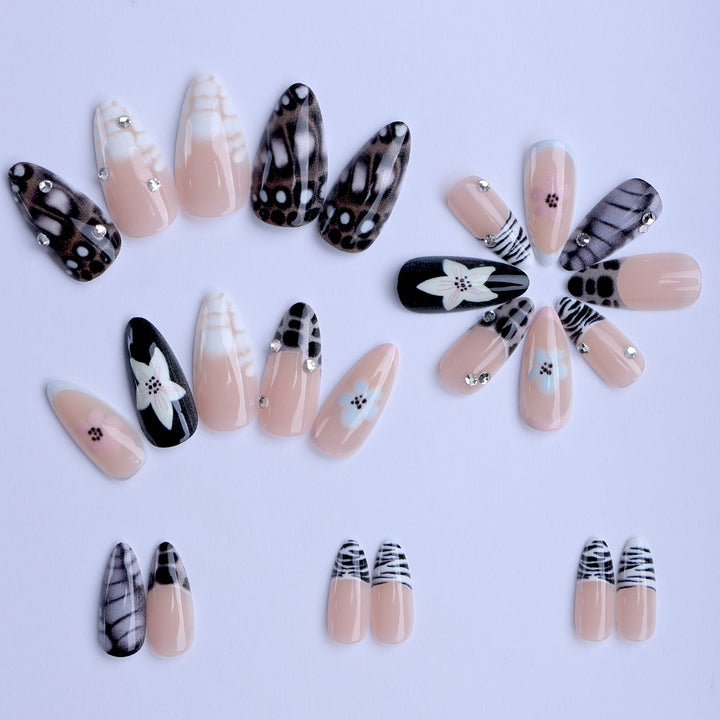 Nail art with elegant designs and embellishments Bowlift