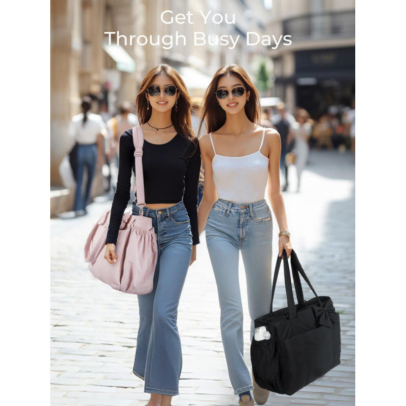 Fashionable tote bag with elegant bow appliqué Bowlift