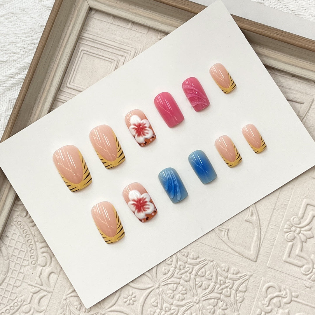 Artistic Press-On Nail Set with Floral and Wave Designs Bowlift