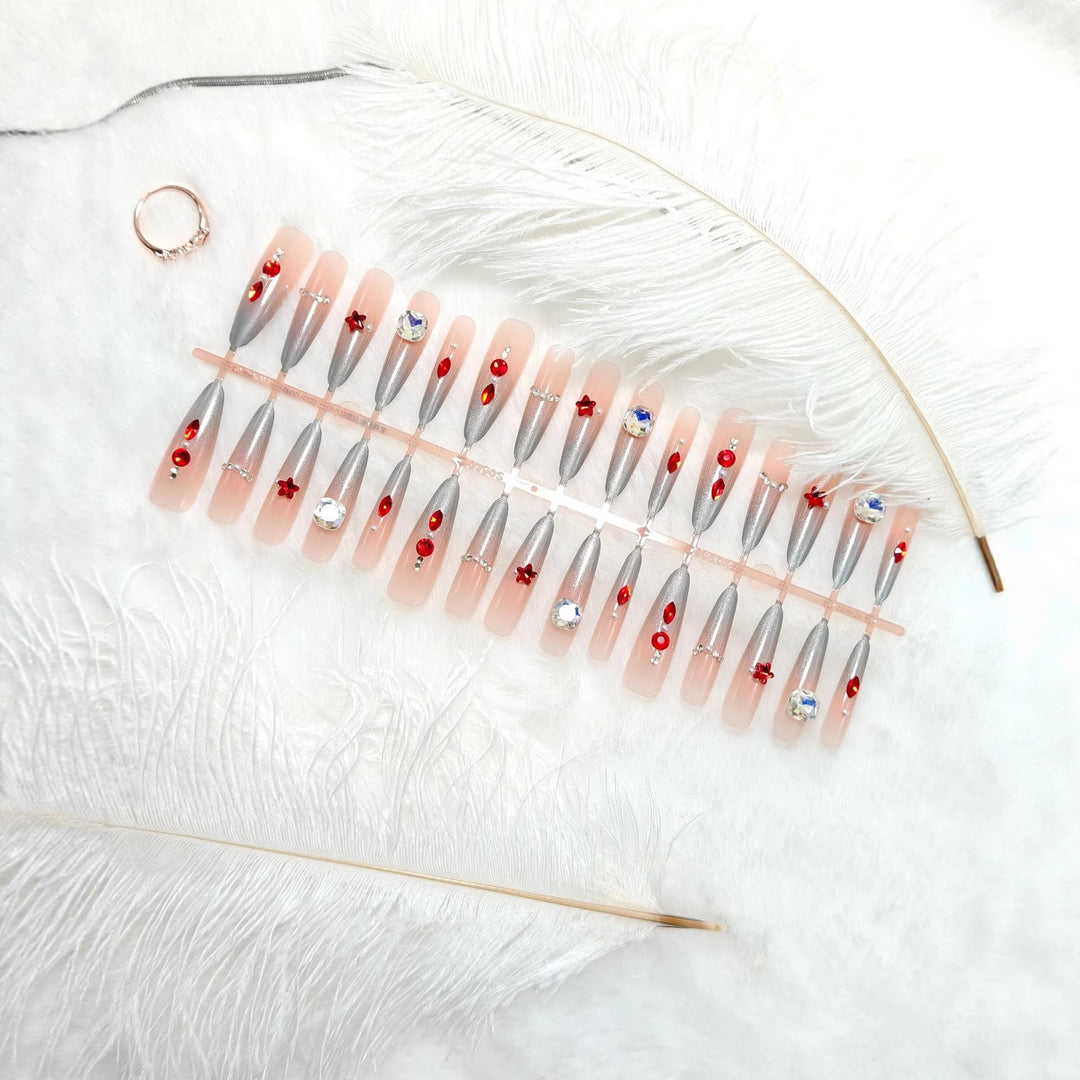 Artificial nails with glamorous design and sparkling accents Bowlift