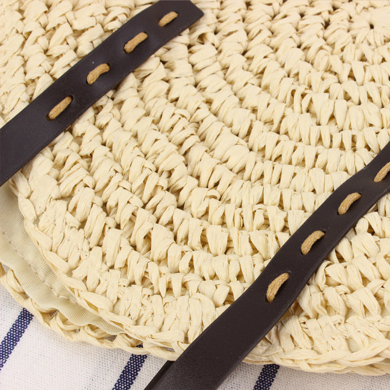 Round basket bag with sturdy leather handles Bowlift