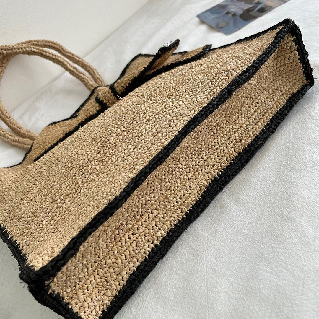 Handcrafted knitted bag with floral design Bowlift