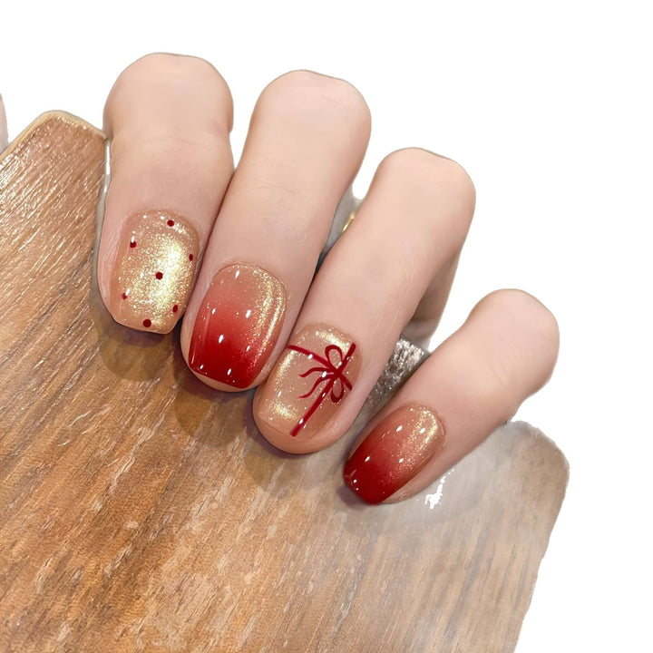 Artificial nails with festive gradient color and elegant decorations Bowlift
