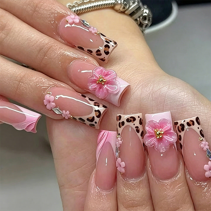 Exclusive artificial nails with elegant animal design and glitter accents Bowlift