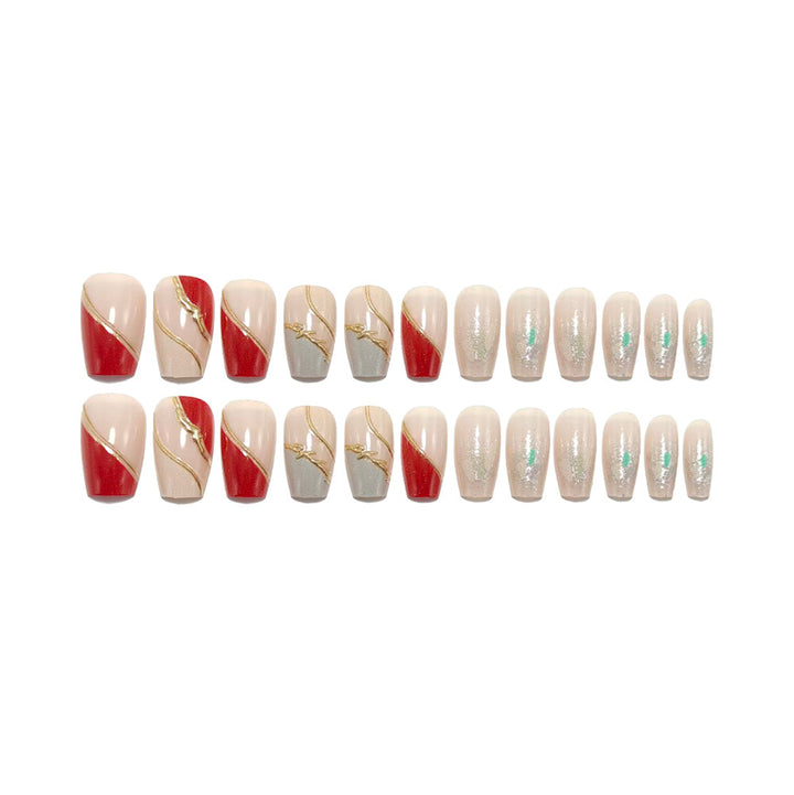 Artificial nails with elegant gold pattern and glitter accents Bowlift