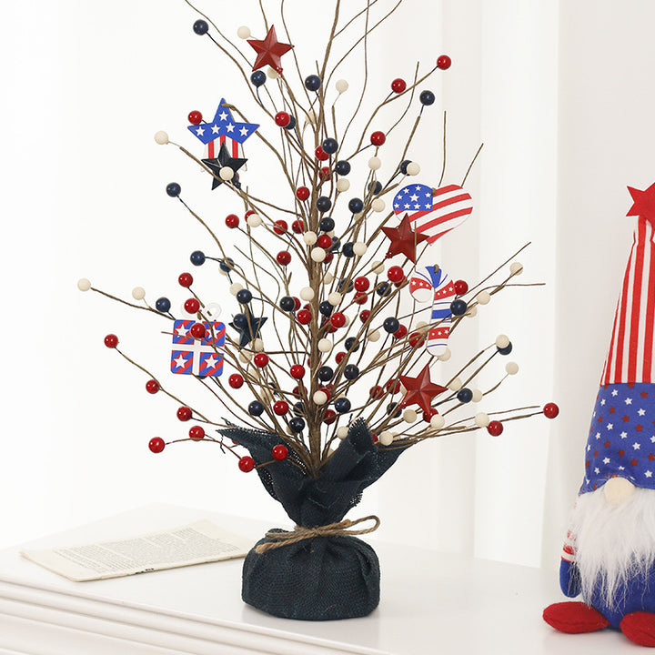 Unisex rustic table arrangement with star and berry branches as focal decoration Bowlift