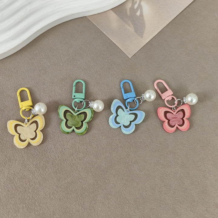 Keychain with butterfly and pearl accent Bowlift