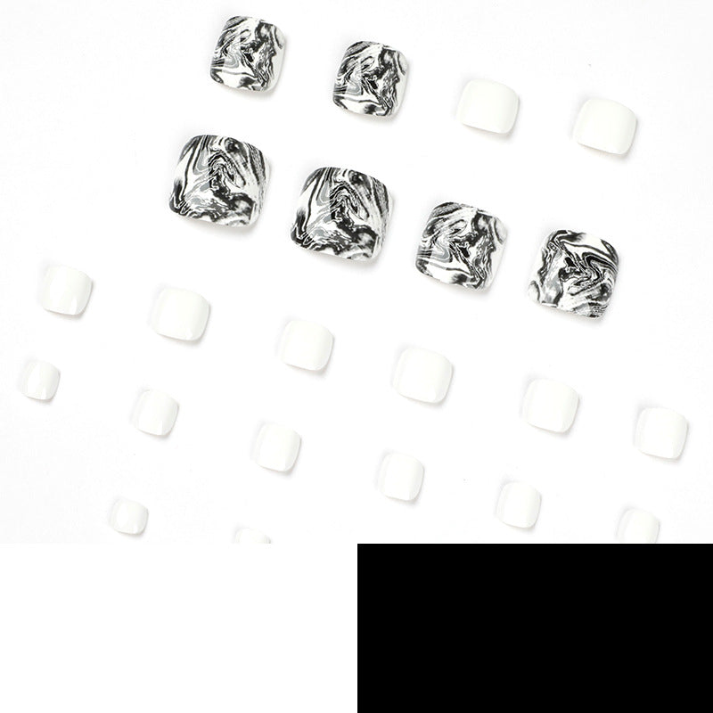 Artful toenail art in elegant marble design Bowlift