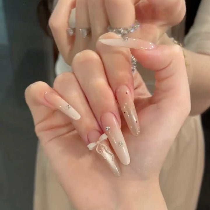 Artistic Stiletto Press-On Nail Set with Decorative Accents Bowlift