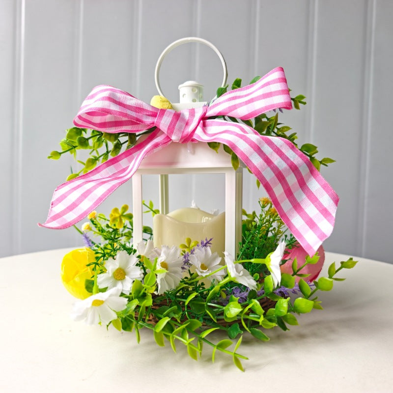 Decorative table lantern with artificial flowers and ribbon Bowlift