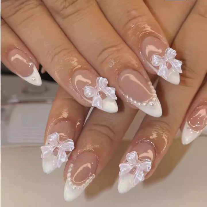 Nail art set with elegant tips and floral accents Bowlift