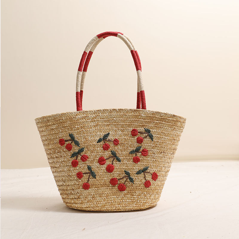 Handcrafted basket bag with vibrant floral embroidery design Bowlift