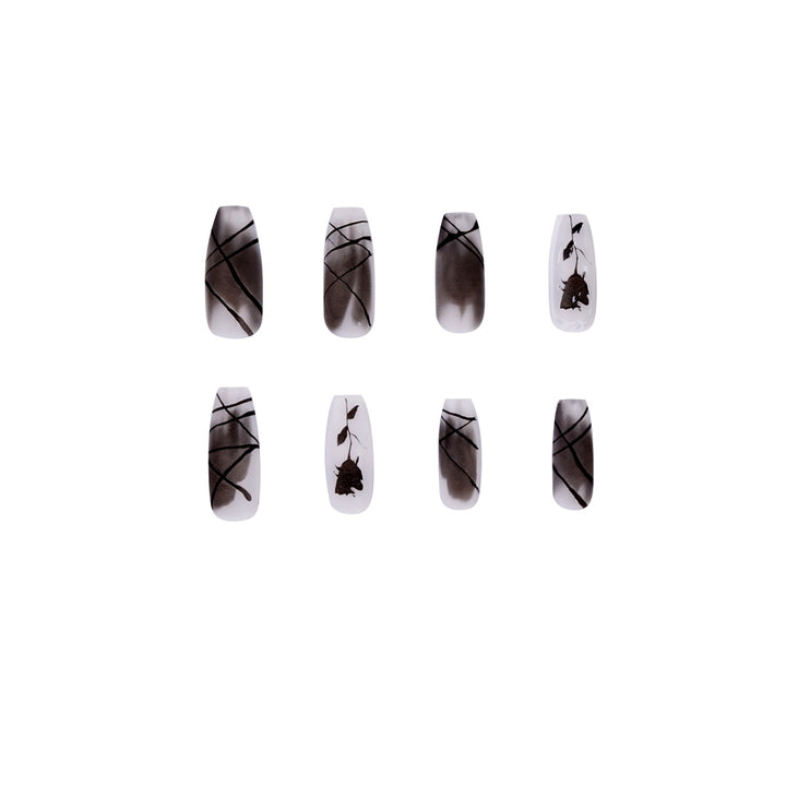 Artful stiletto nails with floral accents Bowlift