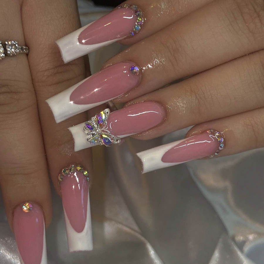 Acrylic nail set with elegant design and sparkling rhinestone accents Bowlift