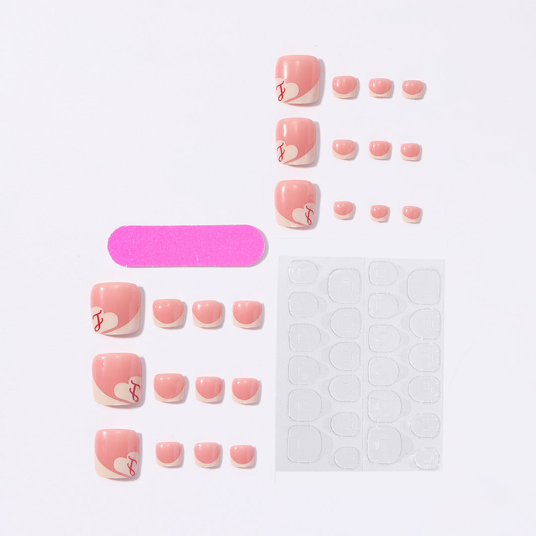 Artificial nail set with elegant French tips and romantic heart designs Bowlift